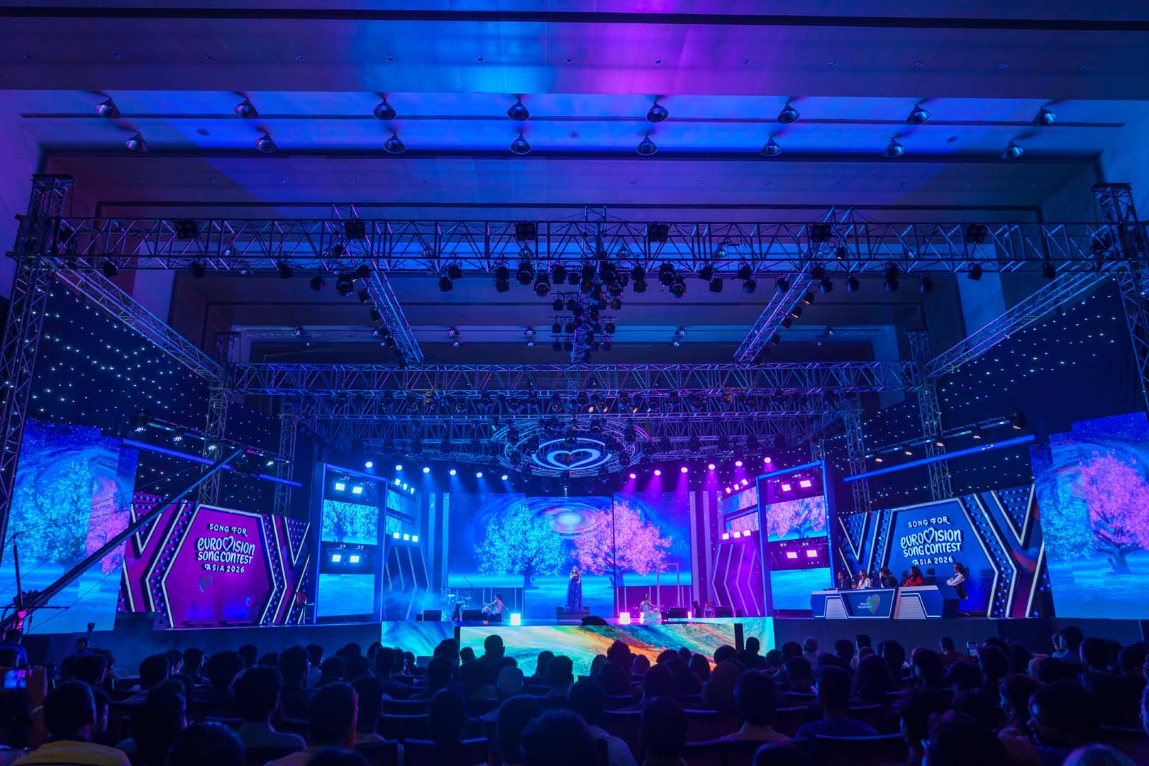 Wide view of the Voice of Bangladesh stage and audience at ICCB
